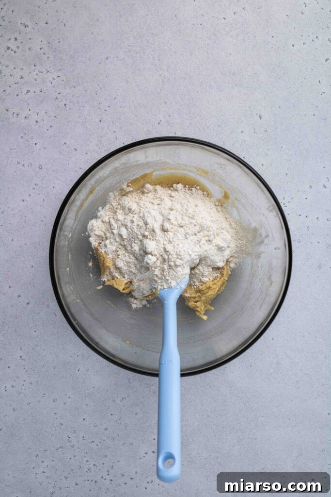 Add the flour to the wet mixture