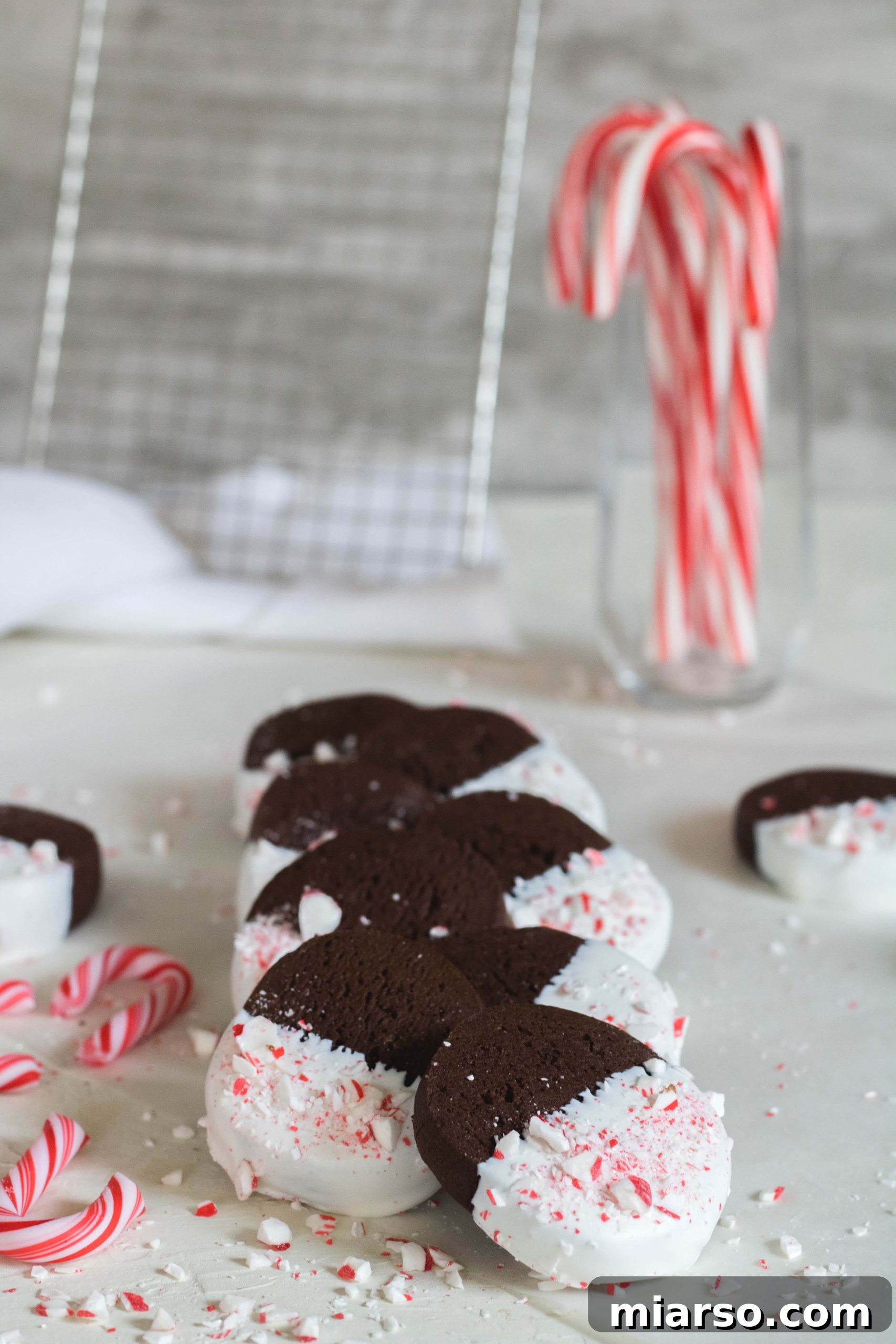 Gourmet Chocolate Peppermint Crunch Logs 11 Close-up of finished chocolate peppermint slice and bake cookies on a cooling rack