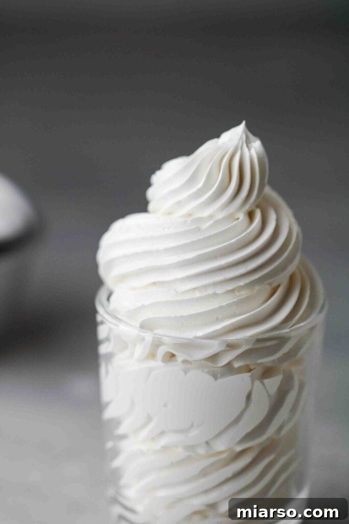 Velvety Small Batch Swiss Meringue Buttercream 14 Swiss meringue buttercream piped in a cup
