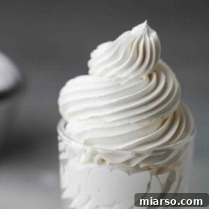 Velvety Small Batch Swiss Meringue Buttercream 15 Swiss meringue buttercream piped in a cup