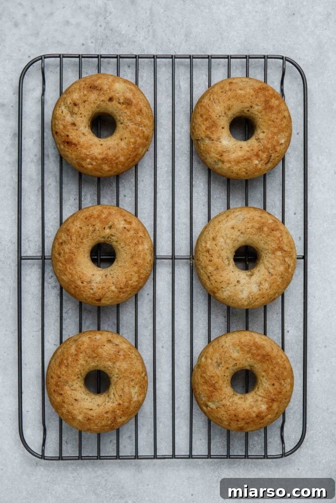 Baked banana donuts carefully transferred to a wire rack to cool completely before glazing.