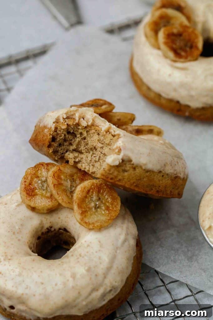 Close-up of the moist and tender texture of a banana donut, ready to be glazed