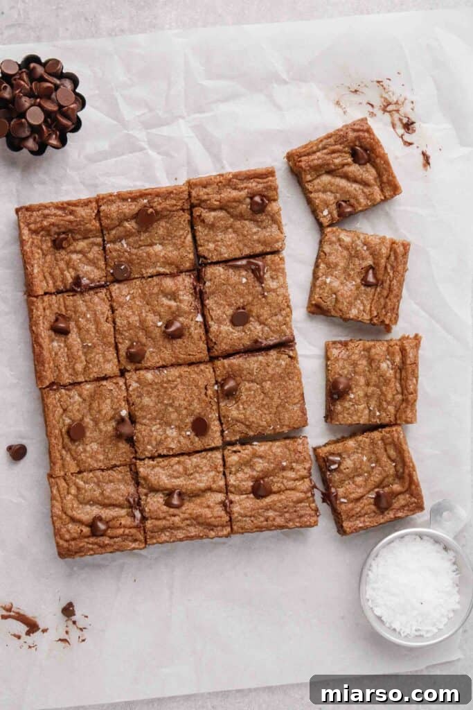 Sweet Tomatoes' Homestyle Chocolate Chip Bars 4 Beautiful overhead photography of golden-brown chocolate chip cookie bars, ready to be enjoyed