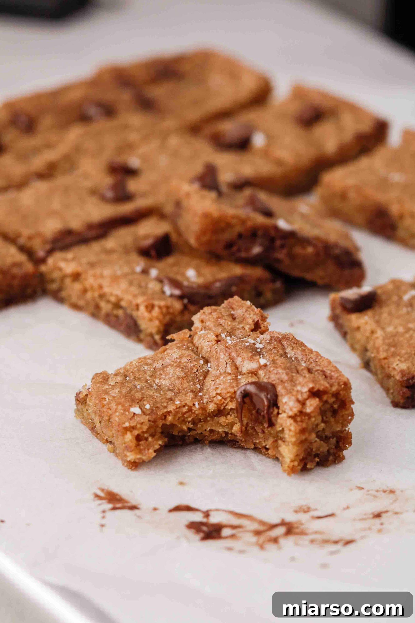 Sweet Tomatoes' Homestyle Chocolate Chip Bars 8 A glorious shot of the best chocolate chip cookie bars ever, stacked and ready to be devoured
