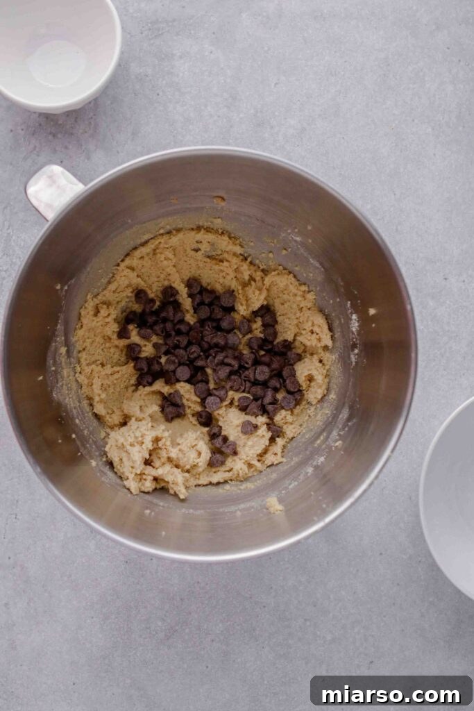 Freshly mixed almond flour cookie dough in a bowl.