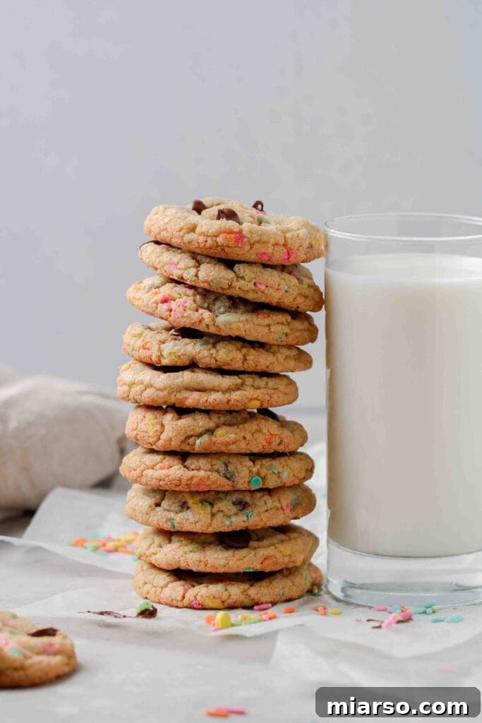 Stack of Easter chocolate chip cookies decorated with pastel sprinkles