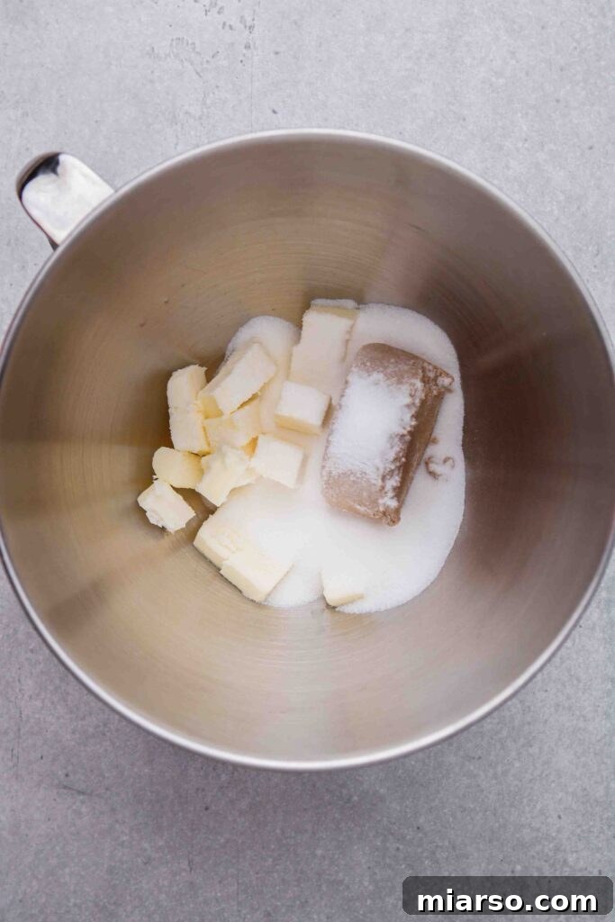 Cream the butter with the sugar until light and fluffy