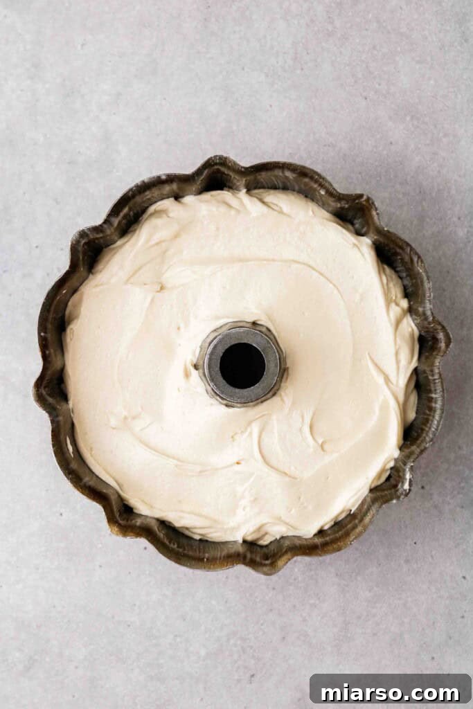 Velvety Vanilla Bundt Perfection 11 Cake batter in bundt pan