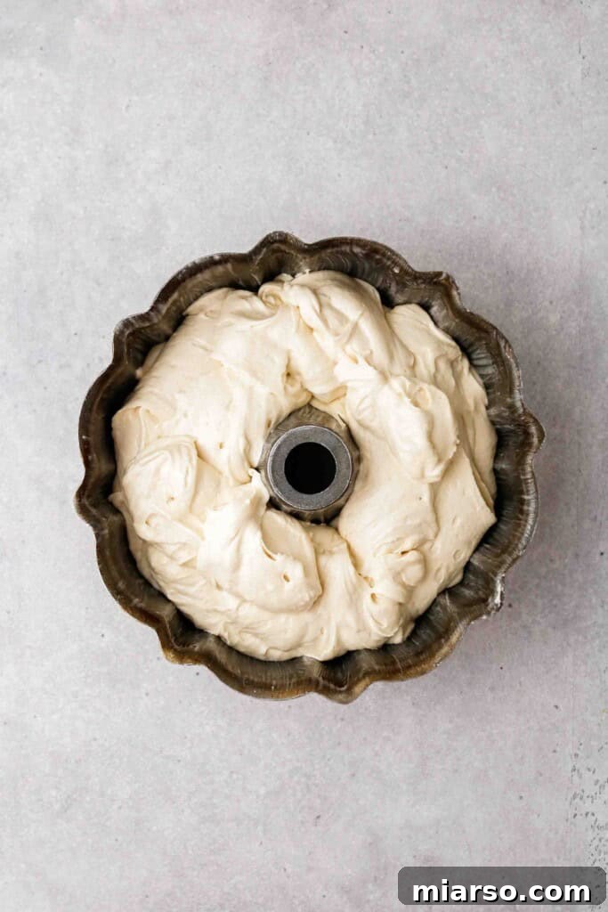 Velvety Vanilla Bundt Perfection 10 Cake batter in bundt pan