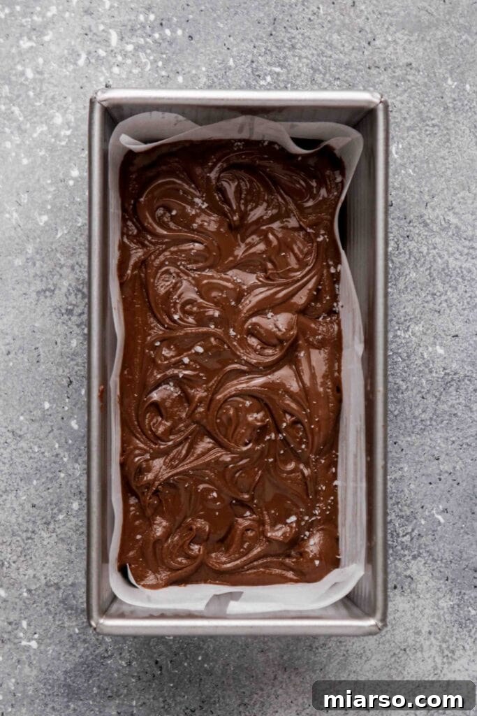 Swirled Nutella brownie batter with sea salt