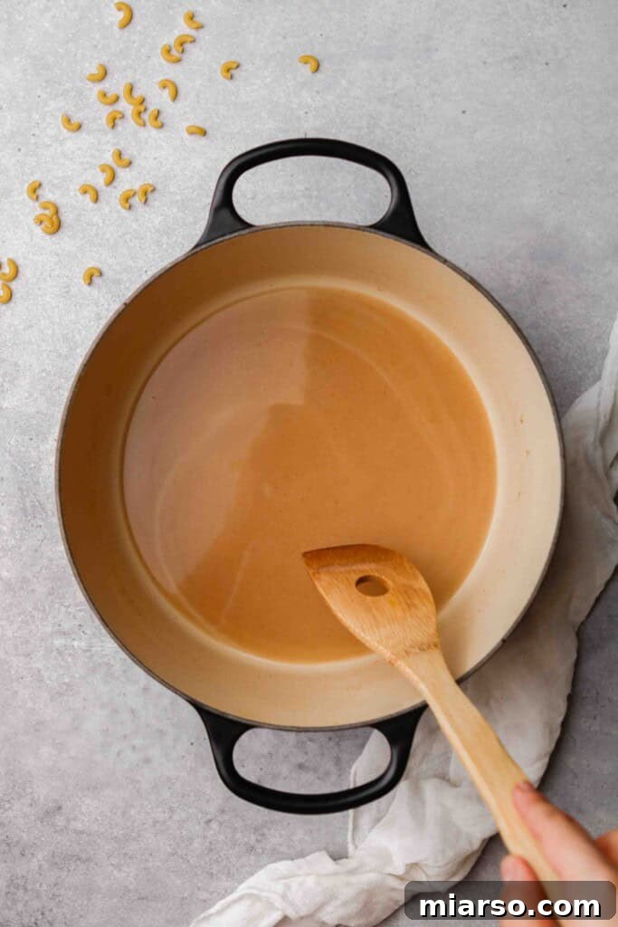 Add water to the butter and flour mixture