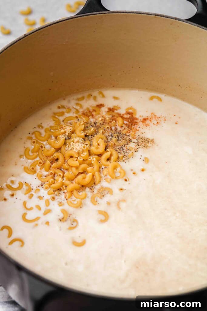 Add the dry pasta to the liquid mixture