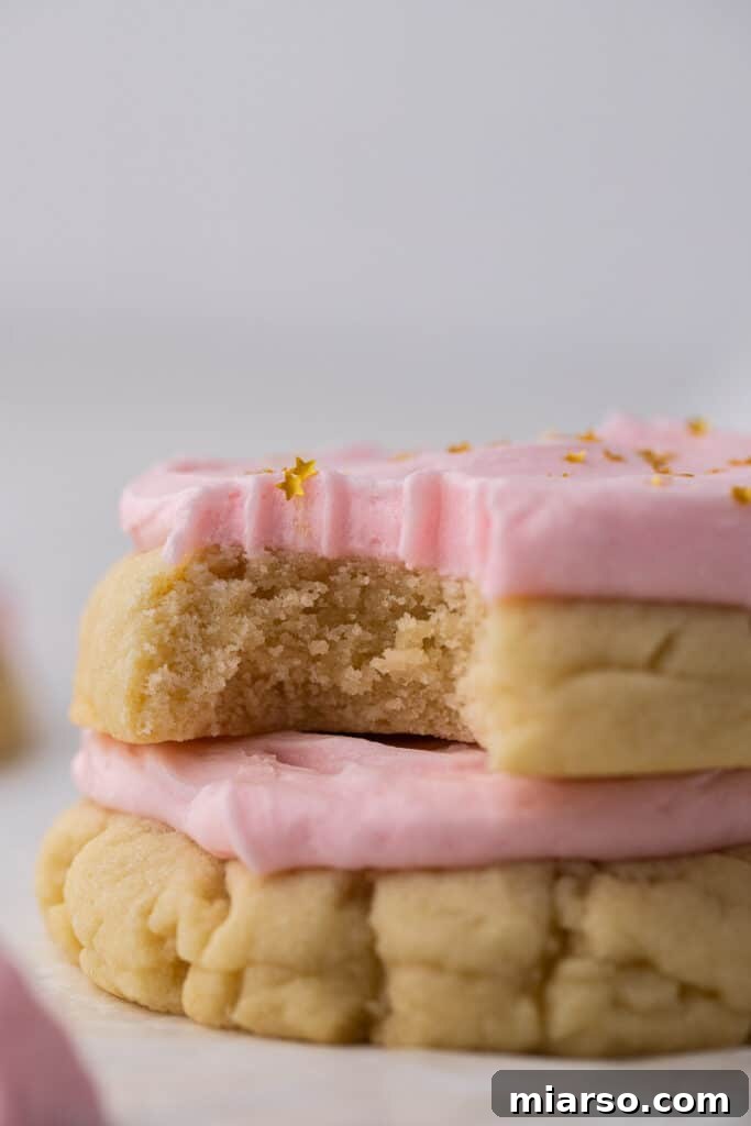 Crumbl sugar cookie copycat recipe with pink almond frosting