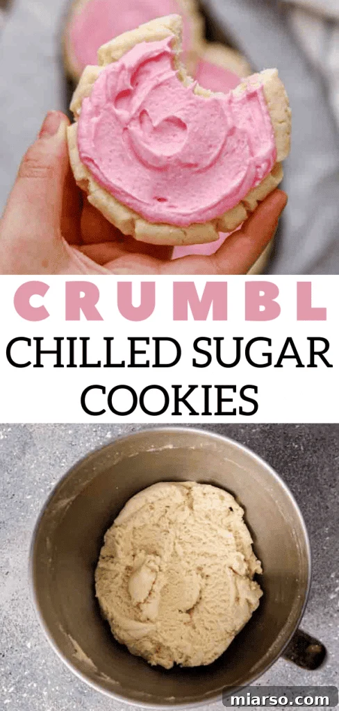 Crumbl sugar cookies with almond frosting arranged on a serving tray