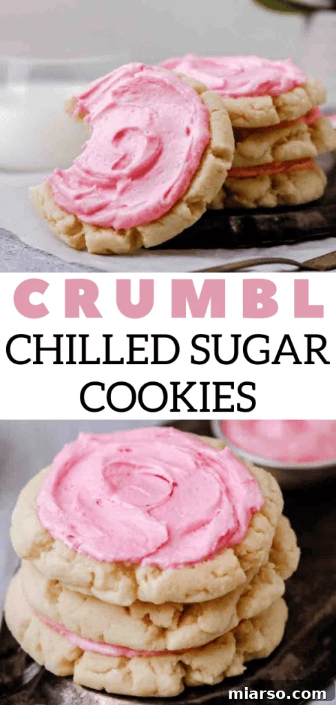 Close-up of a frosted Crumbl sugar cookie with pink icing