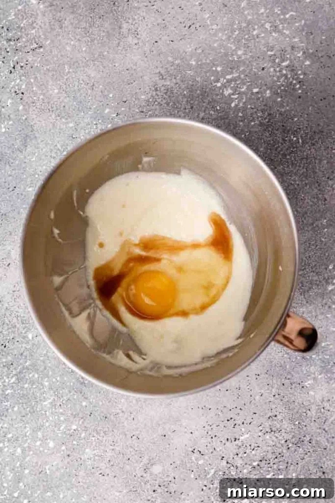 Creaming butter, sugar, and eggs for Crumbl sugar cookie dough