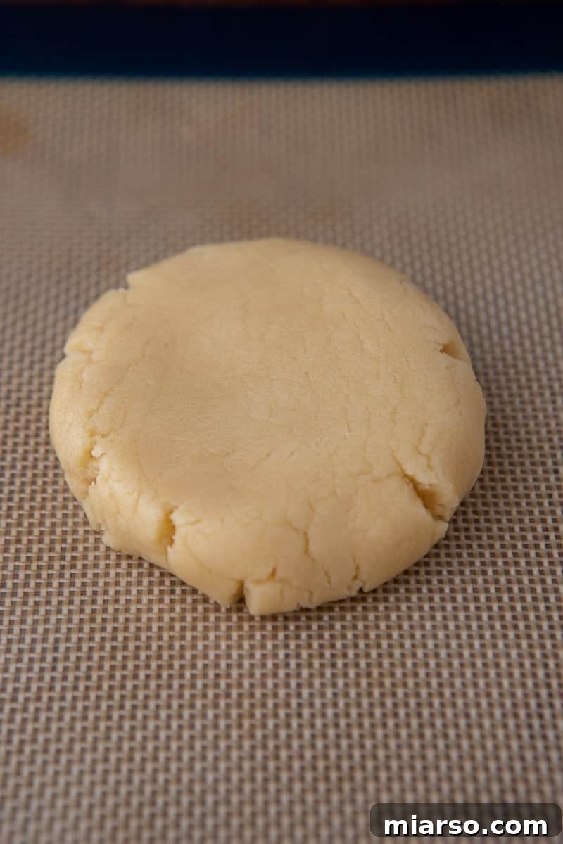 Unfrosted Crumbl sugar cookies cooling