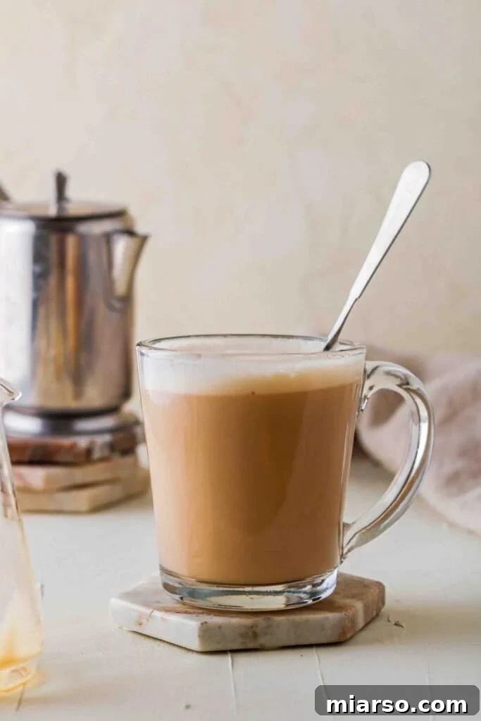 Hot vanilla latte starbucks copycat recipe in a clear mug