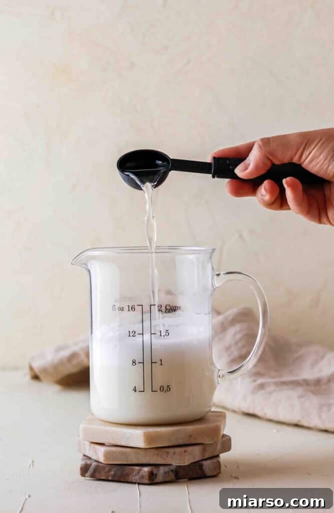 Vanilla syrup added to steamed milk