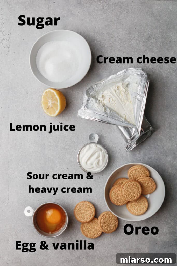 Ingredients for small batch cheesecakes laid out on a surface