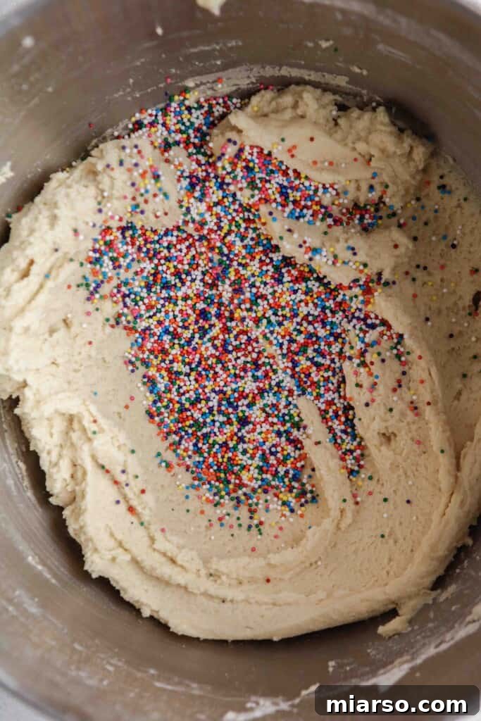 Add the sprinkles to the cookie dough for a festive touch
