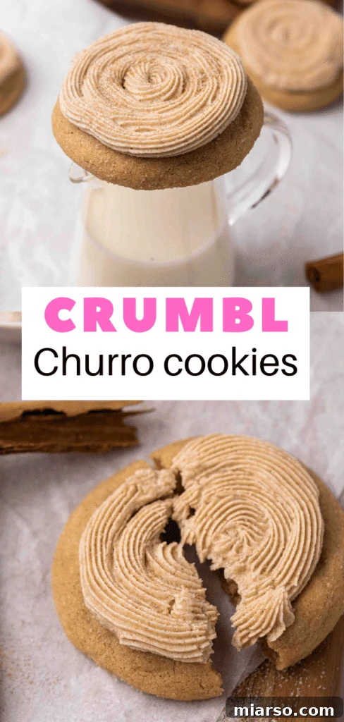 A Crumbl Churro Cookie expertly broken in half, showcasing its rich cinnamon center and fluffy buttercream.