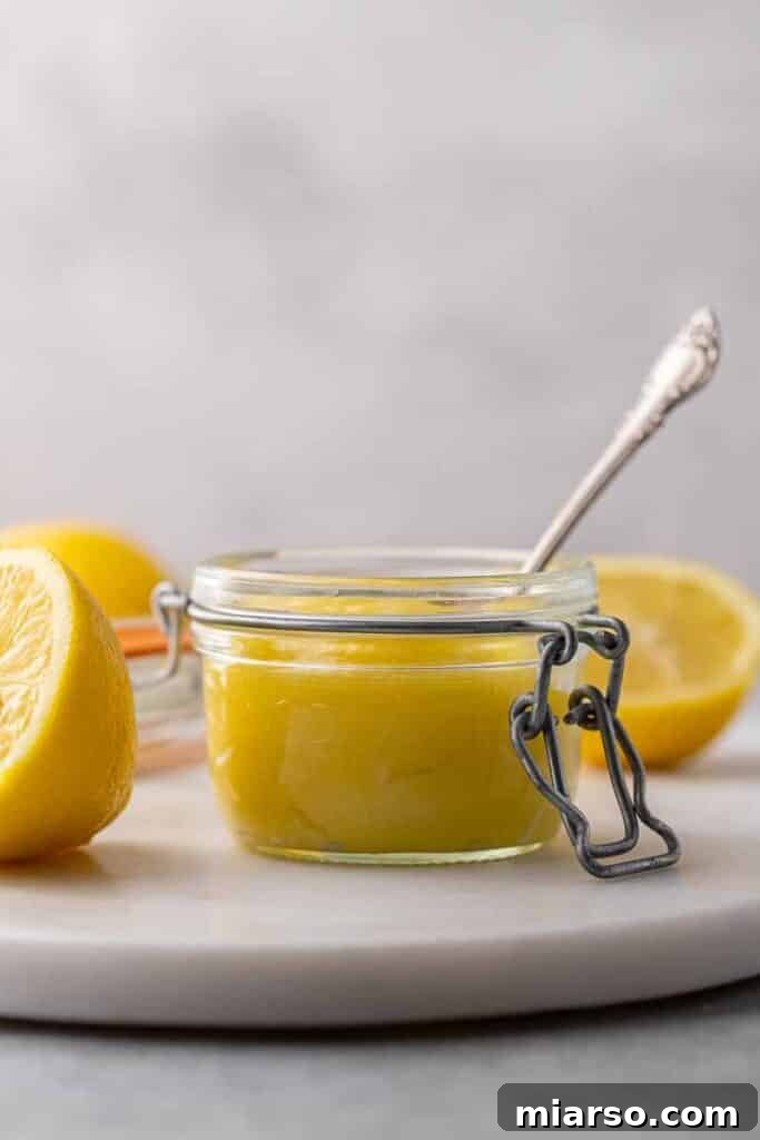Straight on shot of lemon curd in a jar