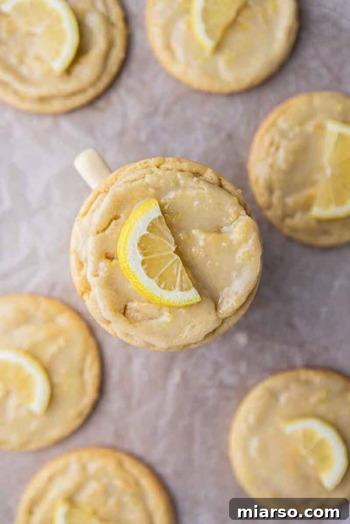 Effortless Crumbl Lemon Glazed Cookies 14 Overhead shot of perfectly glazed CRUMBL Lemon Glaze Cookies.