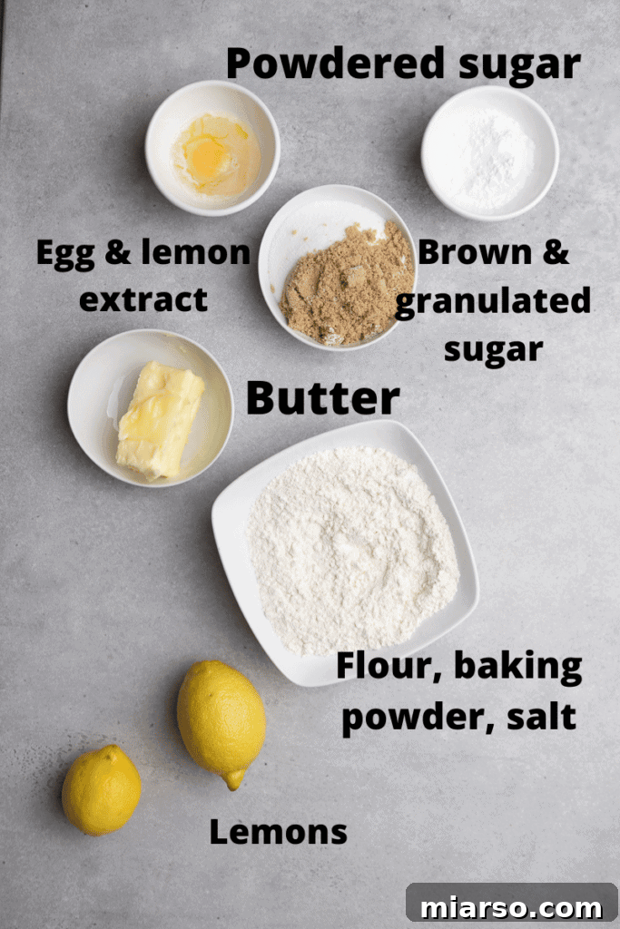 Effortless Crumbl Lemon Glazed Cookies 4 Fresh ingredients laid out for CRUMBL lemon glaze cookies, including lemons, butter, sugar, and flour.