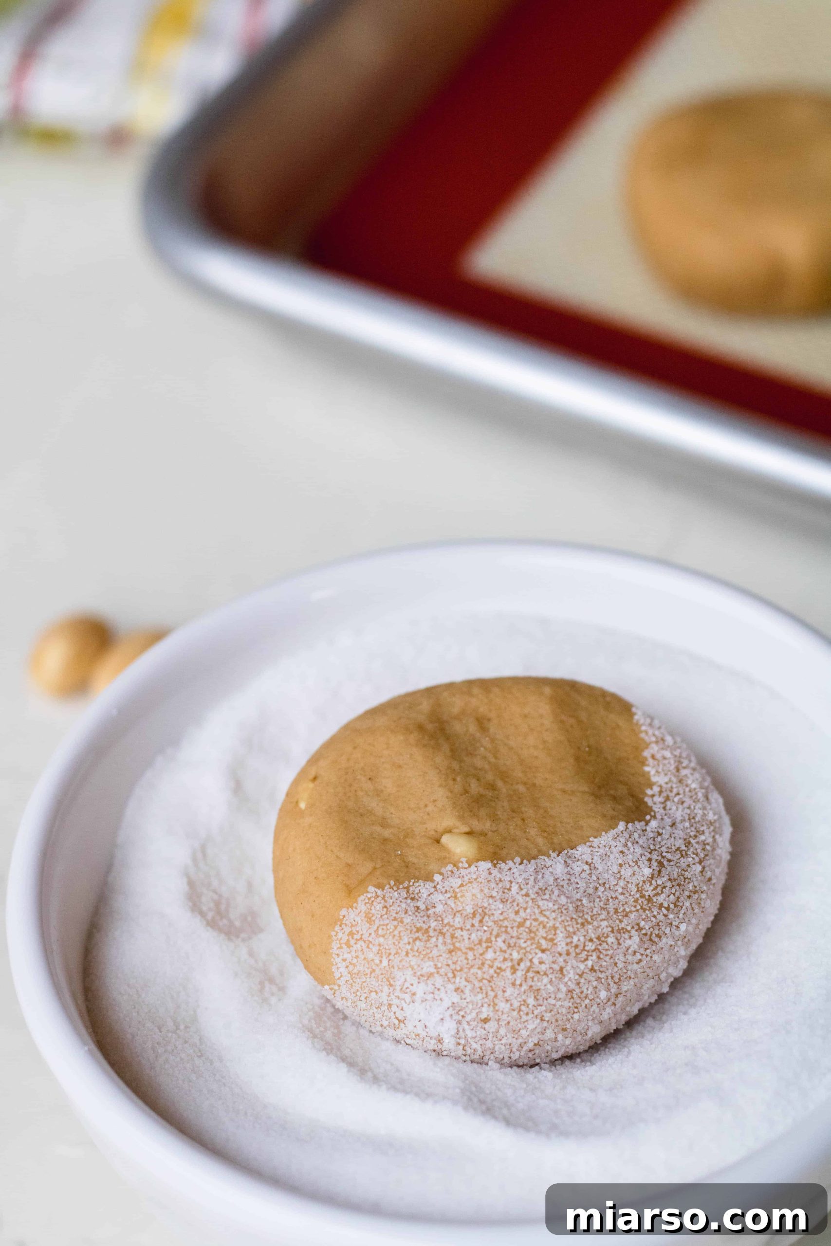 Steps on how to make the best small batch peanut butter cookies - adding egg yolk