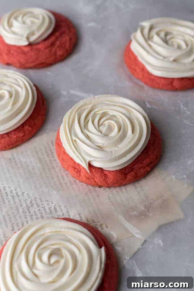 Cream cheese frosted pink velvet cookies