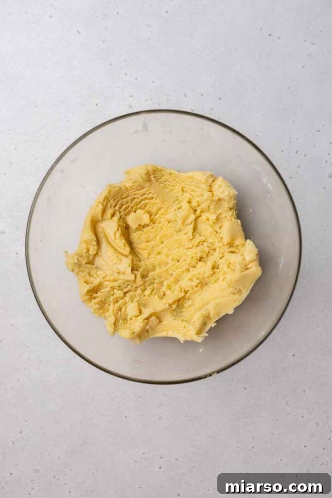 Lime cookie dough in a mixing bowl
