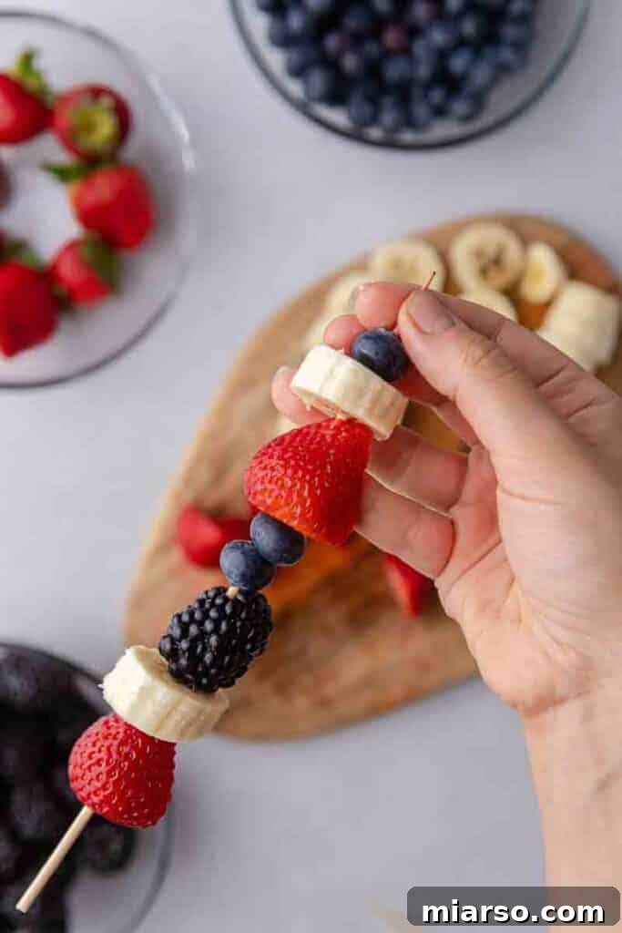 Berries and banana fruit kabobs completed
