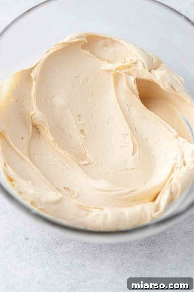 Soft Baked Peanut Butter and Jelly Cookies 11 Smooth, creamy peanut butter buttercream in a mixing bowl.