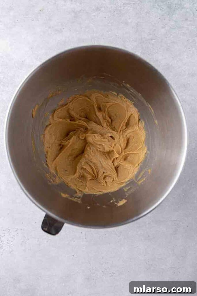 Soft Baked Peanut Butter and Jelly Cookies 6 Close-up of creamed butter mixture in a mixing bowl.