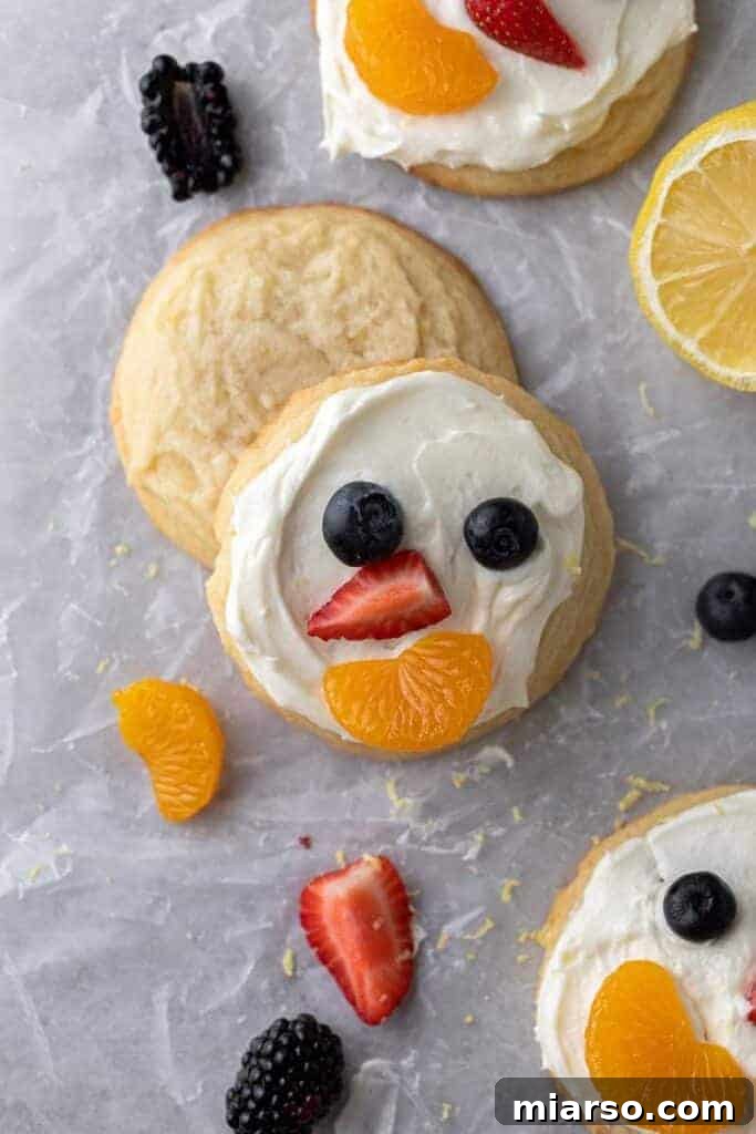 Frosted and unfrosted lemon fruit pizza cookies side by side