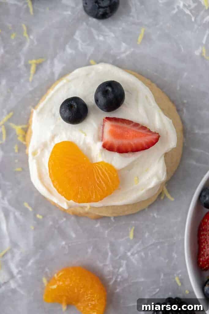 Beautifully frosted CRUMBL fruit pizza cookie