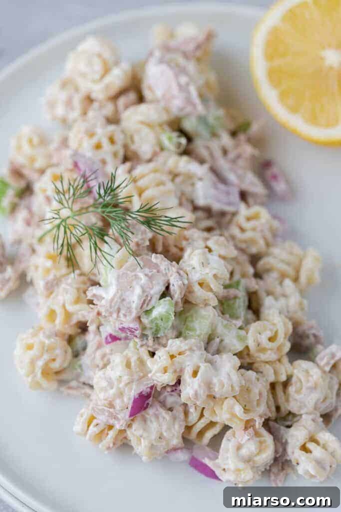 Creamy Greek yogurt and mayonnaise pasta salad with fresh ingredients