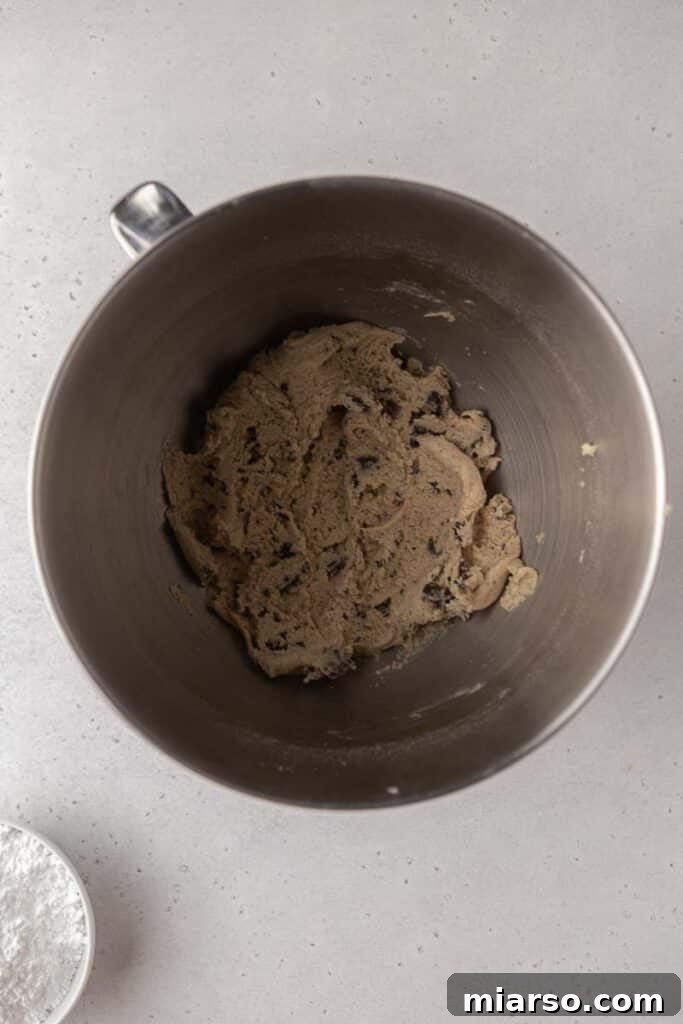 Close-up of cookie dough with crushed oreos