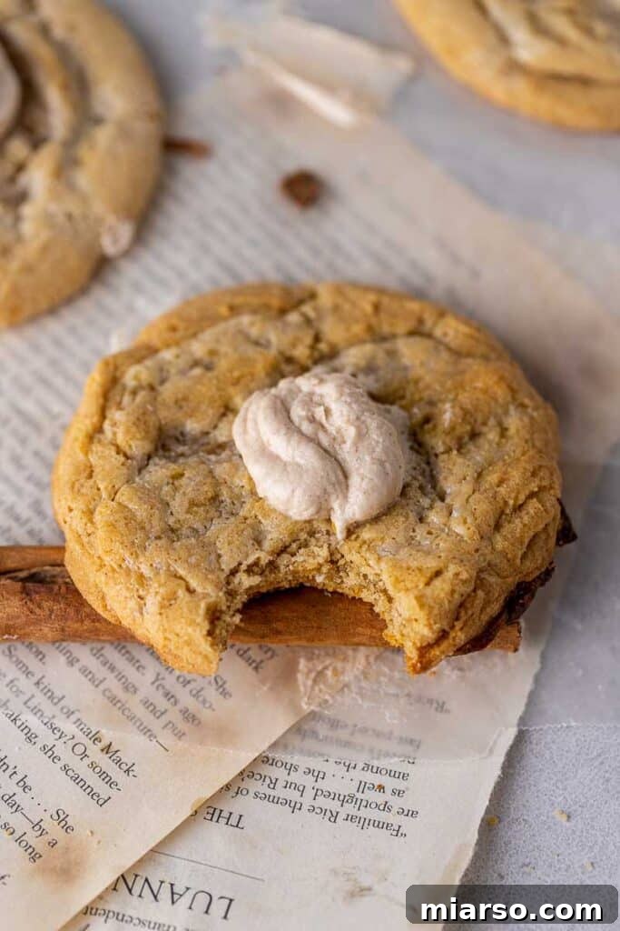 Crumbl cinnamon fry bread cookies with a dollop of cinnamon buttercream