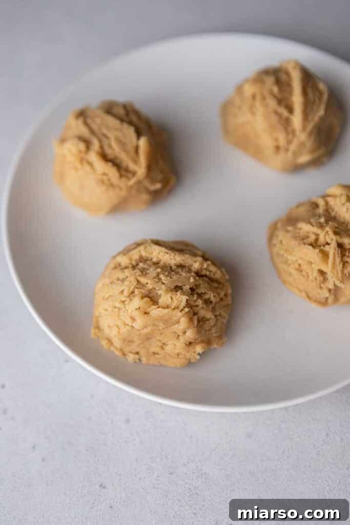 Forming cinnamon fry bread cookie dough balls