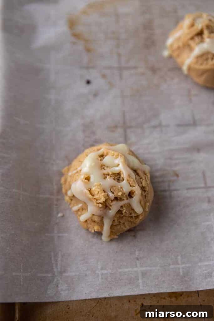 Drizzling sweetened condensed milk on cookie dough