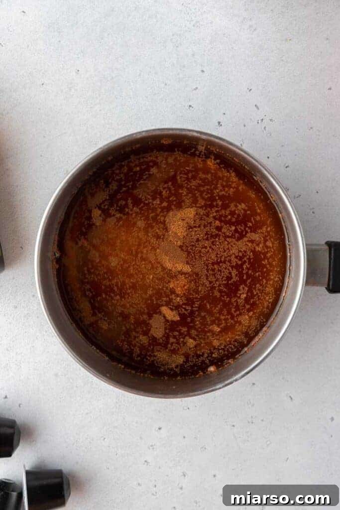 Starbucks Apple Crisp Macchiato 11 Apple crisp drizzle sauce simmering in a saucepan