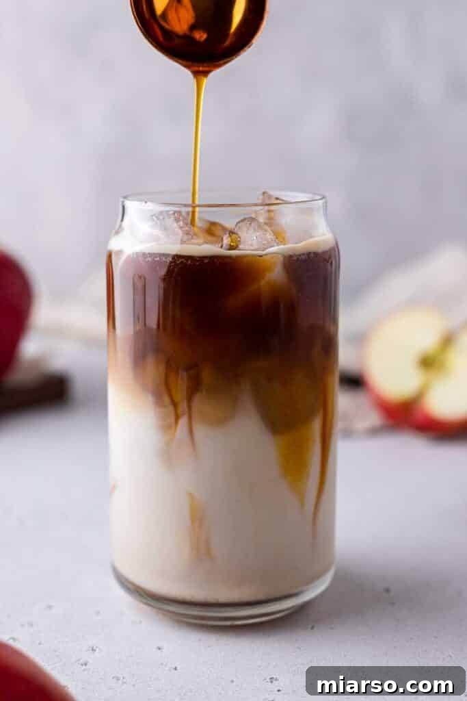 Starbucks Apple Crisp Macchiato 16 Drizzling apple crisp sauce over coffee