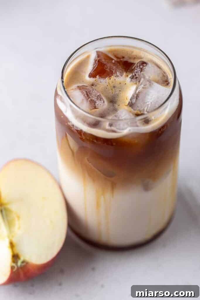 Starbucks Apple Crisp Macchiato 17 Finished Starbucks Iced Apple Crisp Macchiato in a glass