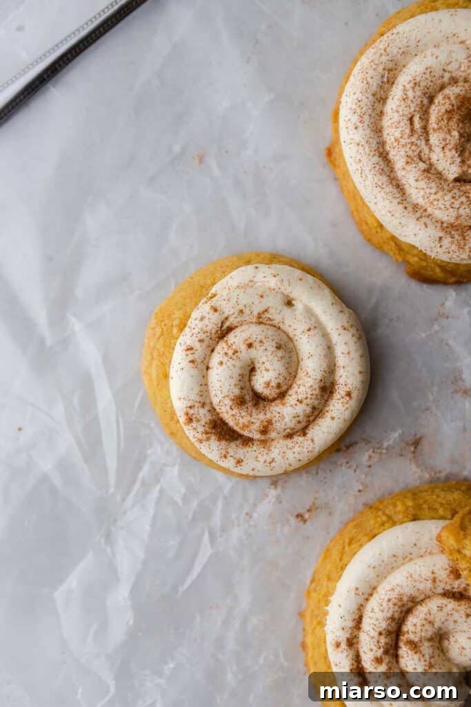 Catering size pumpkin Crumbl cookies arranged neatly.
