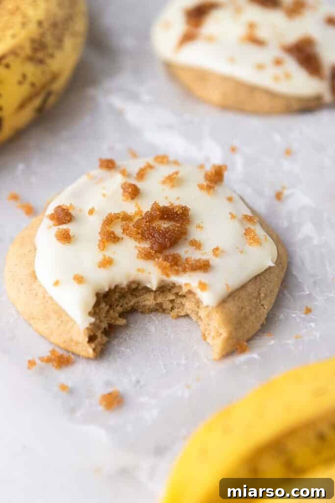Irresistible Crumbl banana bread cookies with a perfect muffin-top texture and creamy glaze.