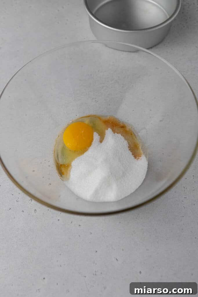 Whisked egg and sugar in a bowl