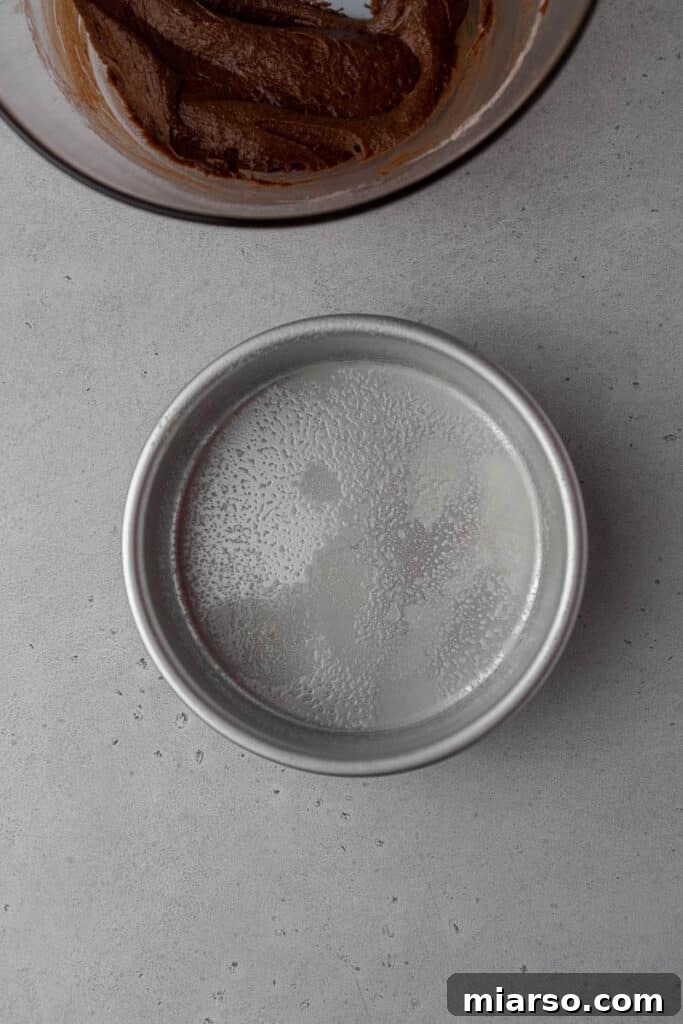 Greased 6-inch round baking pan
