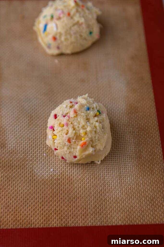 Cookie dough with colorful sprinkles folded in